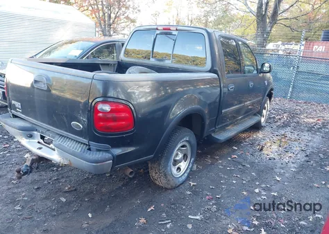 2003 Ford F-150 Lariat/Xlt z USA, uszkodzony, nr VIN 1FTRW08663KB94976